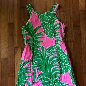 Please note slight ink stains on right side of dress where arm falls